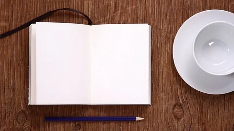 Notebook and cup being filled with coffee Stock Footage 111314354