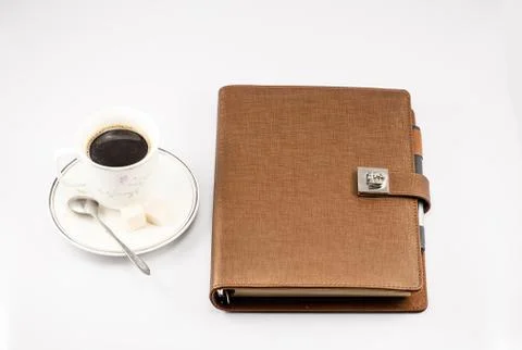 Notebook and a cup of coffee Foto stock