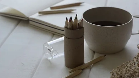 Notebook and diary on white table with panning. Stock Footage 82345392