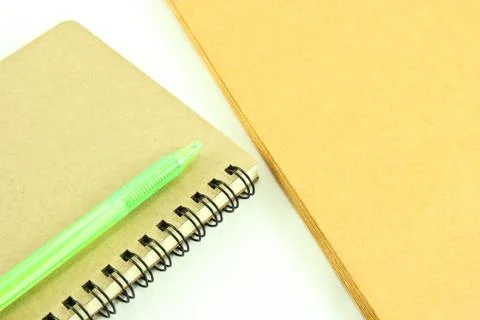 Notebook and envelope on white background Stock Photos