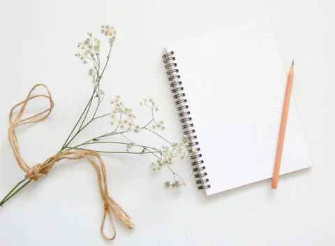 Notebook and flower Stock Photos