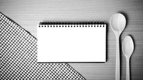 Notebook and kitchen tools black and white color tone style Stock Photos