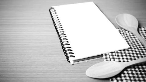 Notebook and kitchen tools black and white color tone style Stock Photos