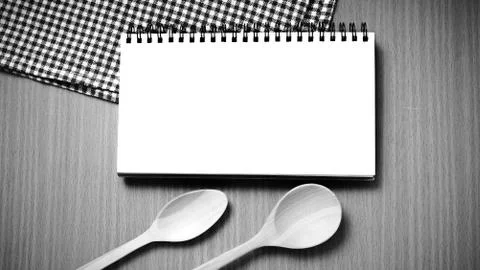 Notebook and kitchen tools black and white color tone style Stock Photos