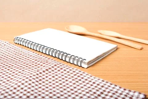 Notebook and kitchen tools Stock Photos