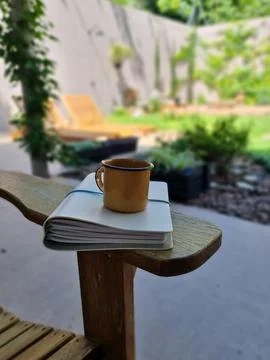 Notebook and Mug on the Balcony Stock Photos