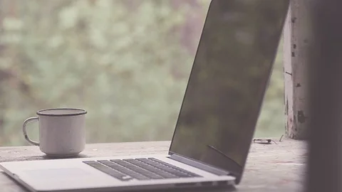 Notebook and mug near the window Stock-Footage 89746205