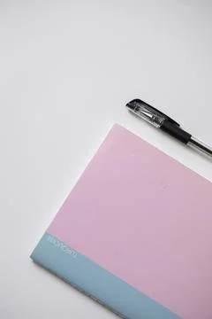 A notebook and a pen isolated on a white background Stock Photos
