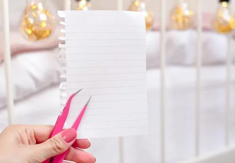 Notebook and a pen for making appointment on eyelash extensions in beauty sal Stock Photos