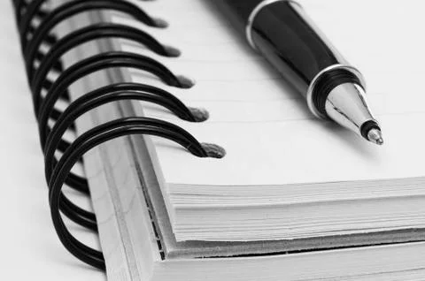 Notebook and pen Stock Photos