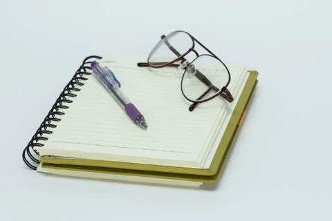Notebook and pen Stock Photos