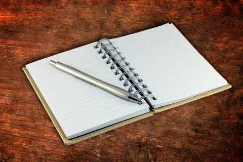 Notebook and pen Stock Photos