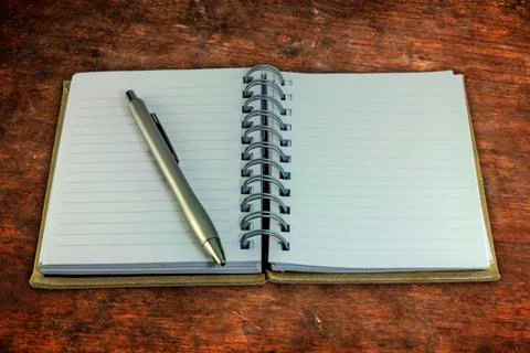 Notebook and pen Stock Photos