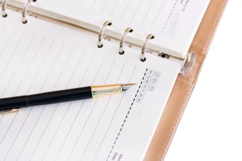 Notebook and pen Stock Photos