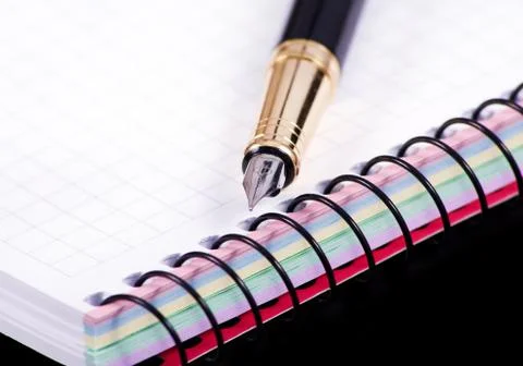 Notebook and pen Stock Photos