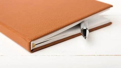 Notebook and pen Stock Photos