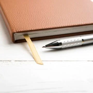 Notebook and pen Stock Photos