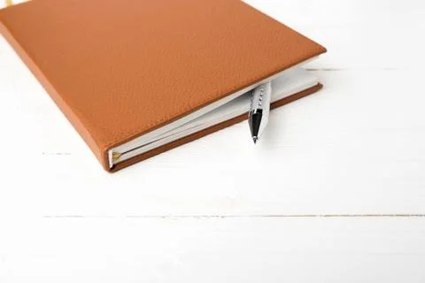 Notebook and pen Stock Photos