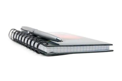 Notebook and pen. Stock Photos