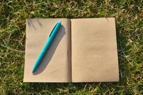 Notebook and pen Stock Photos
