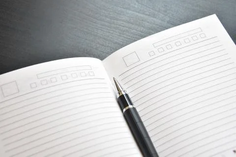 Notebook and pen Stock Photos