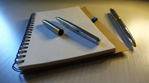 Notebook And Pen Stock Photos