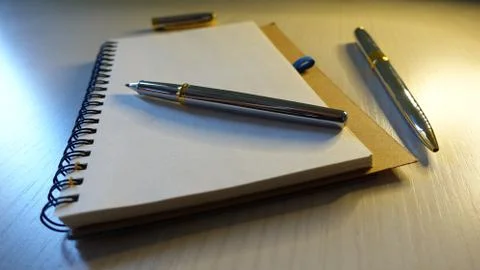 Notebook And Pen Stock Photos