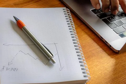 Notebook and pen on the table, office and business Stock Photos