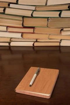 Notebook and pen on the table Foto stock