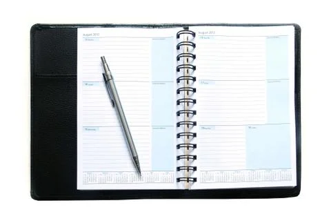 Notebook and pen on white background Stock Photos