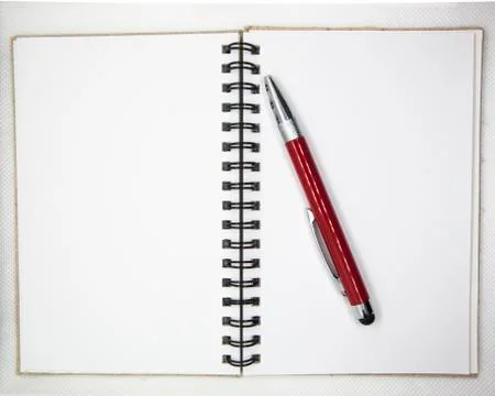 Notebook and pen with white background Stock Photos