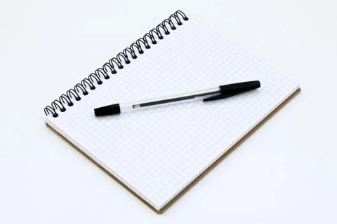 Notebook and pen on a white background Stock Photos