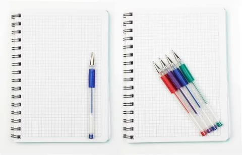 Notebook and pen on white background Photos