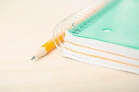 Notebook and pencil up close Stock Photos