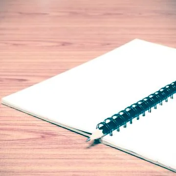 Notebook and pencil Stock Photos