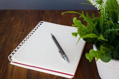 Notebook and pencil Stock Photos