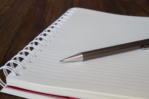 Notebook and pencil Stock Photos