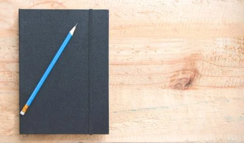 Notebook and pencil Stock Photos