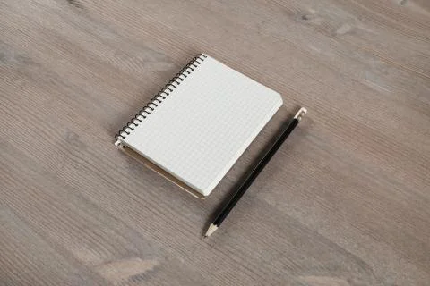 Notebook and pencil Stock Photos