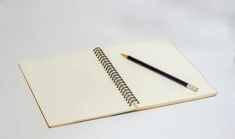 Notebook and Pencil. Stock Photos