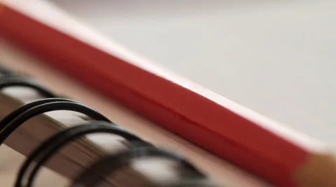 Notebook and pencil red. slider shot. Видео 1805782