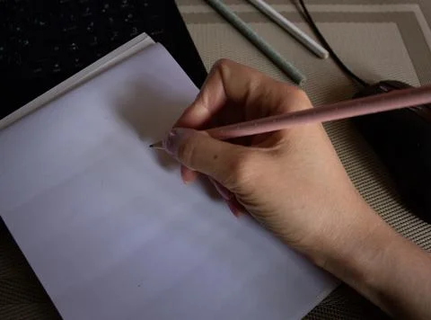 Notebook and pencils on the desktop Stock Photos