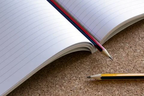 Notebook and pencils Stock Photos