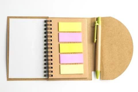 Notebook and postit and pen. Stock Photos