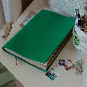 Notebook in autumn composition on the table. Nerd style. Stock Photos
