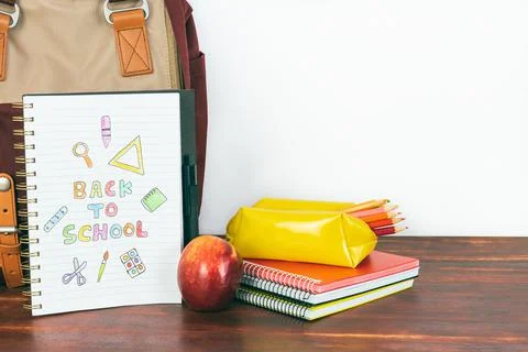 Notebook with back to school drawing. Backpack and school supplies. Foto stock