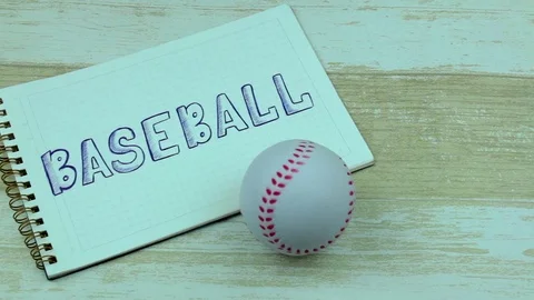 Notebook baseball and a ball Stock Footage 76924996