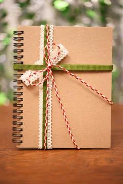 Notebook bind with colorful ribbon Stock Photos