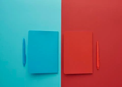 Notebook on a blue and red background Stock Photos