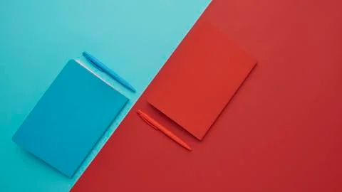 Notebook on a blue and red background Stock Photos